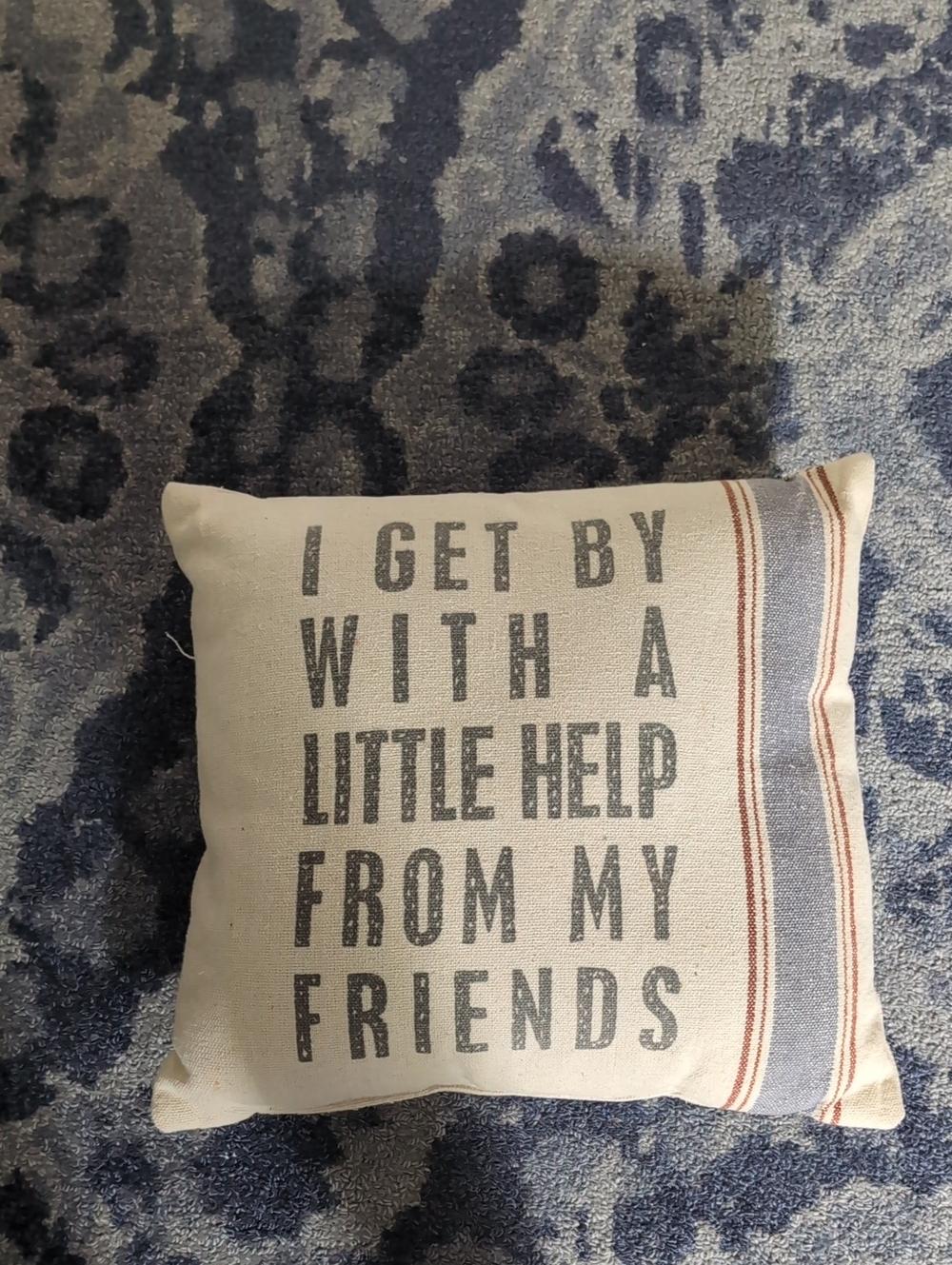 Beige Accent Pillow with Striped Edge and Quote